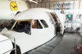 Disassembled airplane for repair and modernization in jet hangar