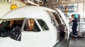 Disassembled airplane for repair and modernization in jet hangar Royalty Free Stock Photo