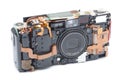 Disassembled compact camera with front removed