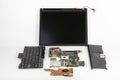 Disassembled laptop, basic components of notebook, screen, keyboard, processor, motherboard, touchpad , CPU fan