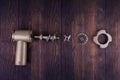 Disassembled meat grinder on wooden table