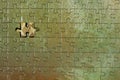 Disassembled puzzle with a last wrong piece impossible to fill Royalty Free Stock Photo