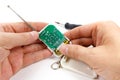 Disassembled security system remote control in man`s hand Royalty Free Stock Photo