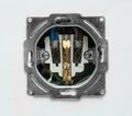 Disassembled socket on white, closeup. Electrician`s equipment