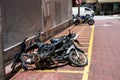 Disassembled by vandals abandoned bike in a parking lot