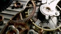Disassembled vintage pocket watch with clockwork turning. Working clock mechanism with rotating spring, gears, gearing