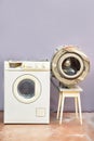 Disassembled washing machine and drum. Gray background. copy space