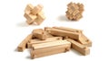 Disassembled Wooden Burr Puzzle with Two Built Puzzles in the Background