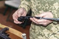 Disassembly of the Kalashnikov assault rifle for subsequent cleaning after shooting and preparation for war