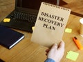 Disaster Recovery Plan in man hands Royalty Free Stock Photo