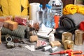 Disaster supply kit for earthquake on grey table Royalty Free Stock Photo