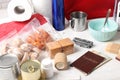 Disaster supply kit for earthquake on white wooden table Royalty Free Stock Photo