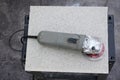 Disc Cutter Power Tool on a Ceramic Tile