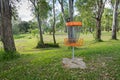 Disc golf (frolf) basket in a park obstacle course Royalty Free Stock Photo