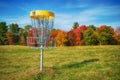 Disc golf hole basket in autumn Royalty Free Stock Photo