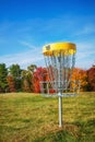 Disc golf hole basket in autumn Royalty Free Stock Photo