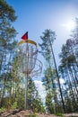 Disc golf hole in the woods Royalty Free Stock Photo