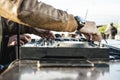 Disc jockey hands playing music for tourist people at beach party outdoor - Live event, music and fun concept - Entertainment and Royalty Free Stock Photo