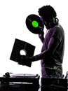 Disc jockey holding vinyl man silhouette Royalty Free Stock Photo