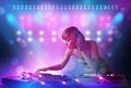 Disc jockey mixing music on turntables on stage with lights and