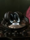 A Disk Jockeys tools - Headphones & Turntable Mixer