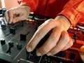 Disc Jockey at work. Royalty Free Stock Photo