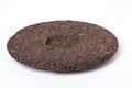 Disc of puer tea isolated on a white background Royalty Free Stock Photo