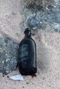 Discarded Bottle Dumped on a Beach