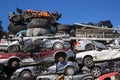 Discarded Cars Stacked at Junk Yard