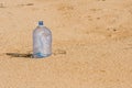 Discarded empty five gallon plastic bottle