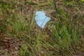 Discarded face mask on the ground Coronavirus