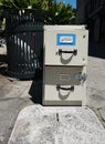 Discarded File Cabinet on a downtown sidewalk. Royalty Free Stock Photo