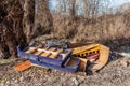 Discarded furniture in nature. Garbage Dumped in Beautiful Nature Royalty Free Stock Photo