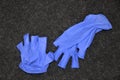 Discarded pair of blue latex medical gloves, Closeup