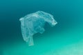 Discarded Plastic Bag Drifting in Tropical Pacific Ocean Royalty Free Stock Photo