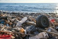 Discarded plastic trash pollution on contaminated ocean sea coast ecosystem,environmental waste