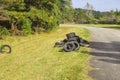 Discarded tires on the side of the road