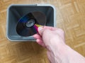 Discarding a computer laser CD, the concept of obsolescence of computer components, the evolution of computer