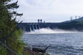 Discharge of excess water from floodgates during flooding.