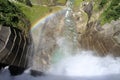 Discharge from Kurobe dam with rainbow Royalty Free Stock Photo