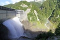 Discharge from Kurobe dam with rainbow Royalty Free Stock Photo