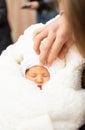 Discharge from maternity hospital. Young mother holding baby in maternity hospital. Royalty Free Stock Photo