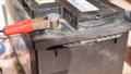 discharged machine battery. battery on charge. close up