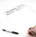 Disciplinary Action- (marker and hand with pen included to be pa Royalty Free Stock Photo