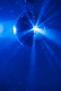 disco ball background with blue shiny rays