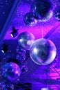 Disco ball with bright rays, night party with blue background. Party dance hall celebration at night club with lots of Royalty Free Stock Photo