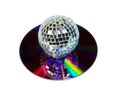 Disco Ball with music CD isolated over white Royalty Free Stock Photo