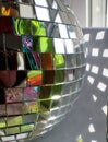 disco ball & reflections from glass bottles with sunlight