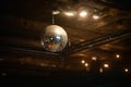 Disco ball under the ceiling in the restaurant Royalty Free Stock Photo