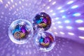 Disco balls with mirror reflections and lights at a night party in a bar or club Royalty Free Stock Photo